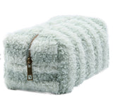 Green striped sherpa makeup bag with a zipper closure.