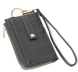 Grey basketweave faux leather wristlet with card holder and zip up wallet .  