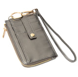 Bronze basketweave faux leather wristlet with card holder and zip up wallet .  