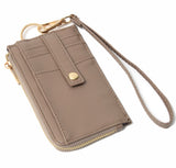 Cumin basketweave faux leather wristlet with card holder and zip up wallet .  