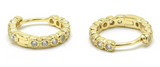 Vermeil over sterling silver huggie earrings with round cz stones.