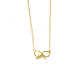 Vermeil over sterling silver chain necklace with a bow pendant.