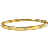 Vermeil over sterling silver bangle bracelet with cz flowers.