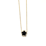 Vermeil over sterling silver necklace with a black enamel and cz flower pendant.