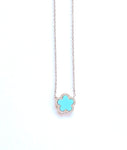 sterling silver turquoise flower outlined in cz's.