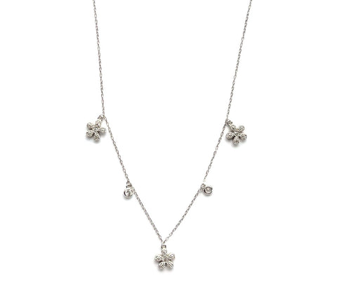 Sterling silver and cz's dangling flowers and bezel stones.