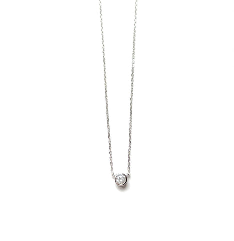Sterling silver necklace with a round bezel set cz pendant