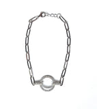 Sterling silver paperclip chain with a cz open circle.