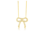 Vermeil over sterling silver chain necklace with a cz bow.