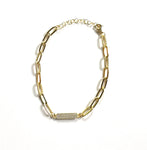 Vermeil over sterling silver chain link bracelet with a small cz bar.